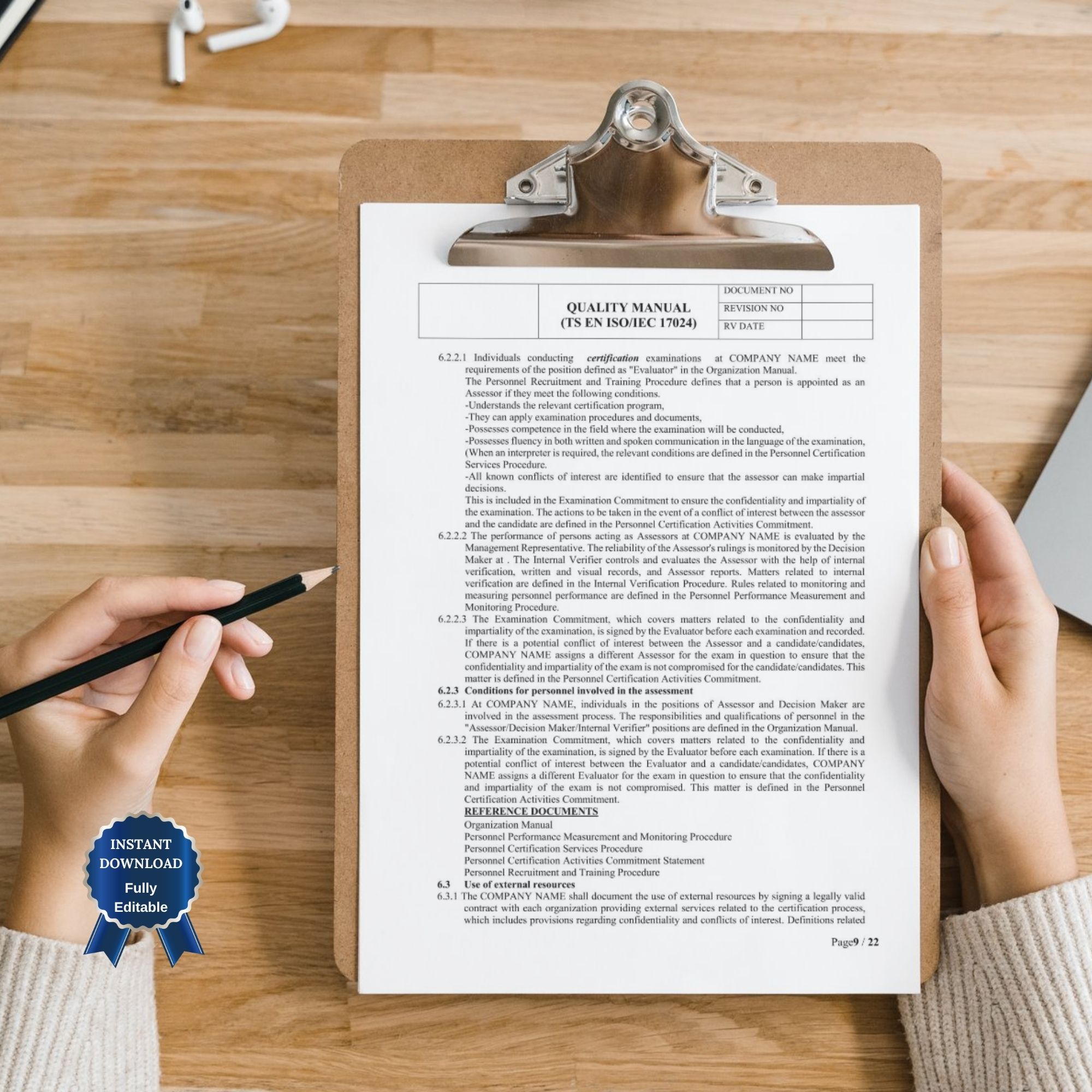 ISO certification document on clipboard – quality manual template example
