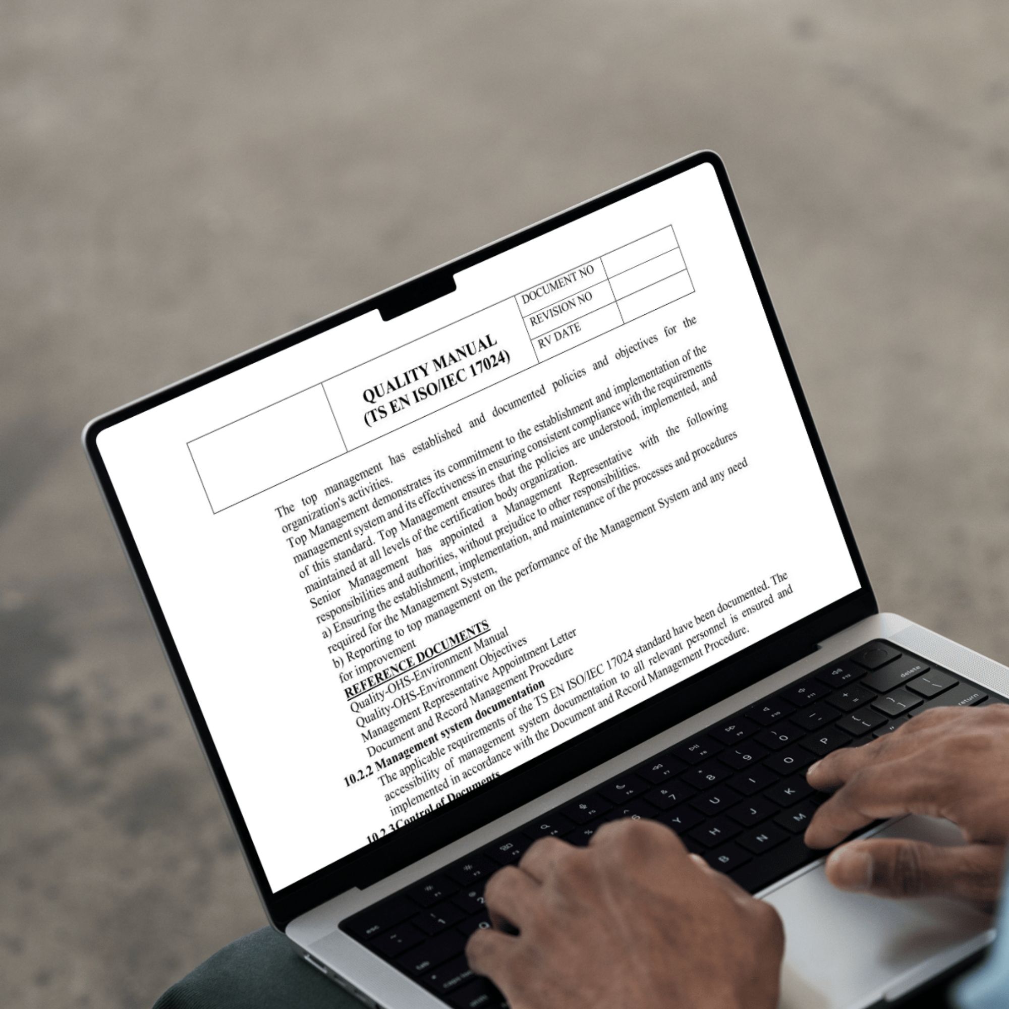 ISO certification procedure document on laptop screen – editable file format