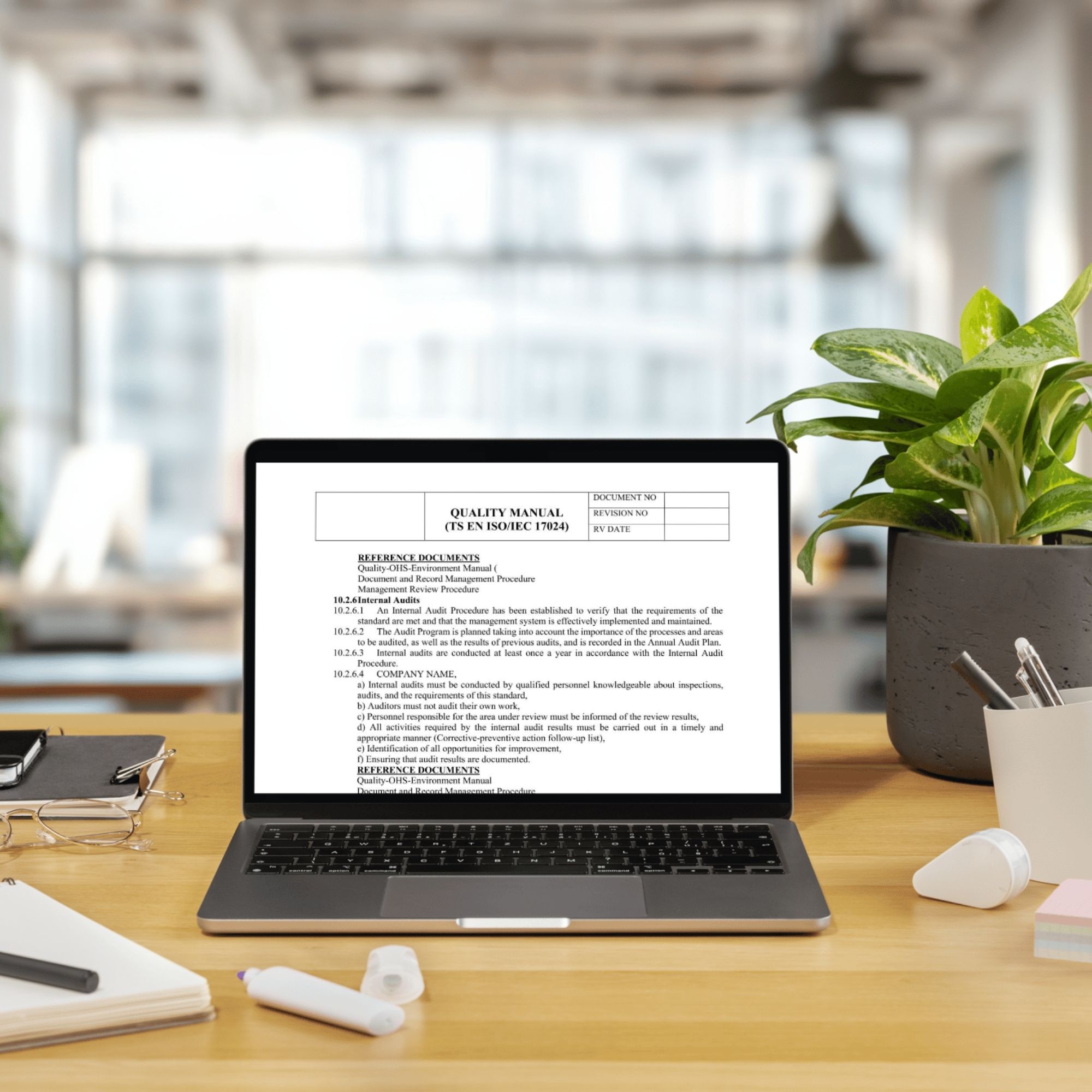 ISO quality management document on laptop – professional template download
