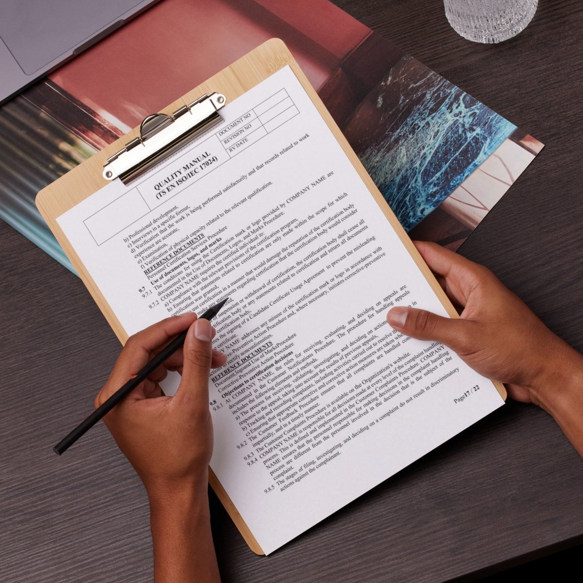 ISO quality manual document being filled out – editable certification template