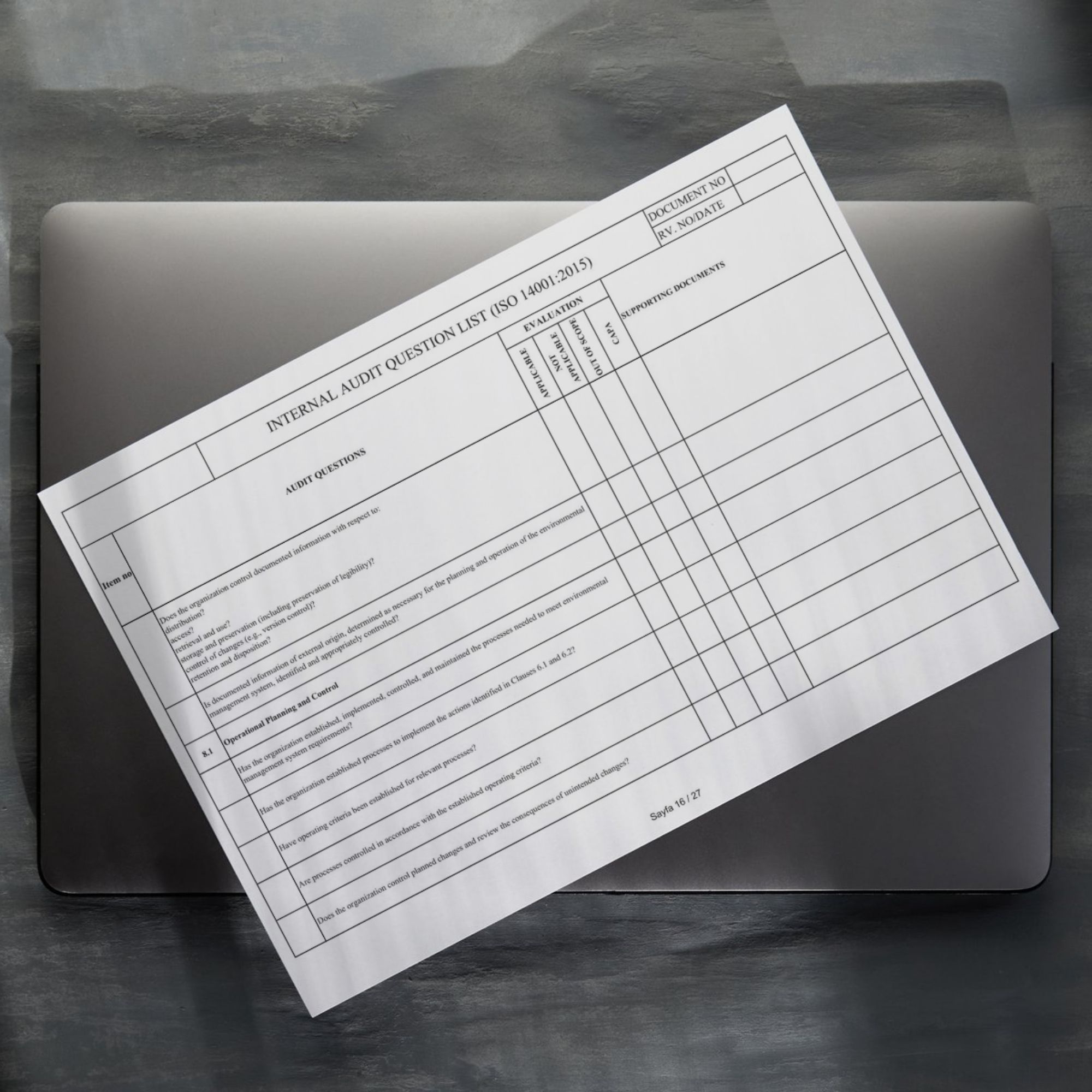 ISO 14001 internal audit checklist Excel sheet preview layout on desk